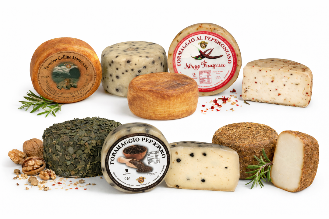 Selezione di pecorini toscani artigianali assortiti disposti elegantemente su sfondo bianco