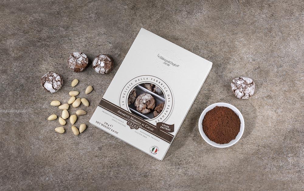 "Senza Glutine, Ricchi di Gusto - Assapora la bontà autentica degli Amaretti al Cacao senza dover rinunciare al gusto." "Momenti Deliziosi Senza Glutine - Ideali per una pausa dolce, gli Amaretti al Cacao sono adatti a tutti i momenti."