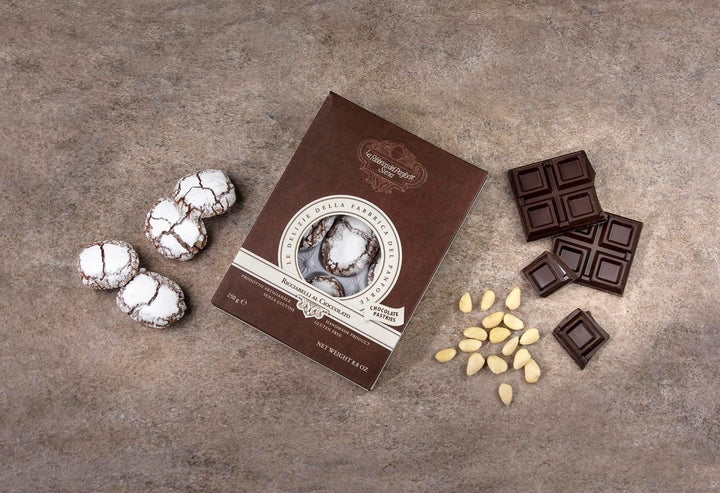 Ricciarelli al Cioccolato Artigianali - Salumeria Toscana Ricciarelli al Cioccolato ArtigianaliFabbrica del PanforteSalumeria Toscana Biscottidolci natalizi toscani, acquista i ricciarelli al cioccolato